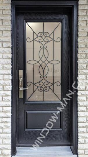 black entry door with glass fiberglass single with blackburn 3/4 wrought iron glass with multi point lock oak grain