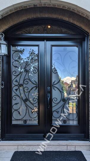 black exterior double doors with campbellsford full wrought iron glass with round transom