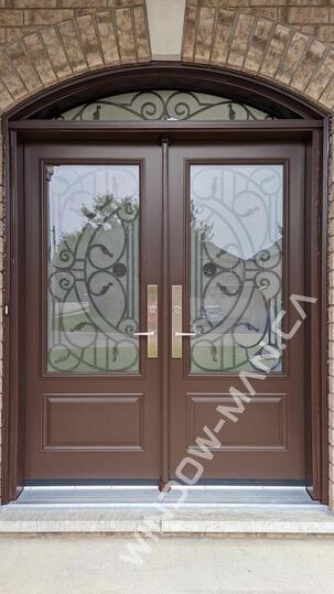double entrance doors in nutmeg with san antonio 3/4 wrought iron glass with multi point locking system with round transom