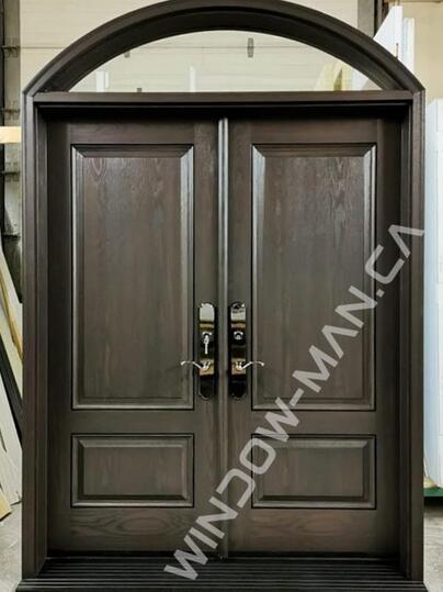 fiberglass double entry doors stained in dark oak with 3 point lock with round transom oak grain
